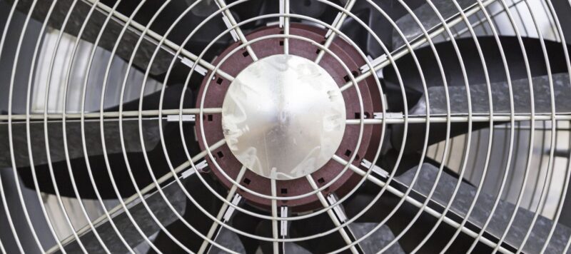 a close-up image of the fan on an ac unit