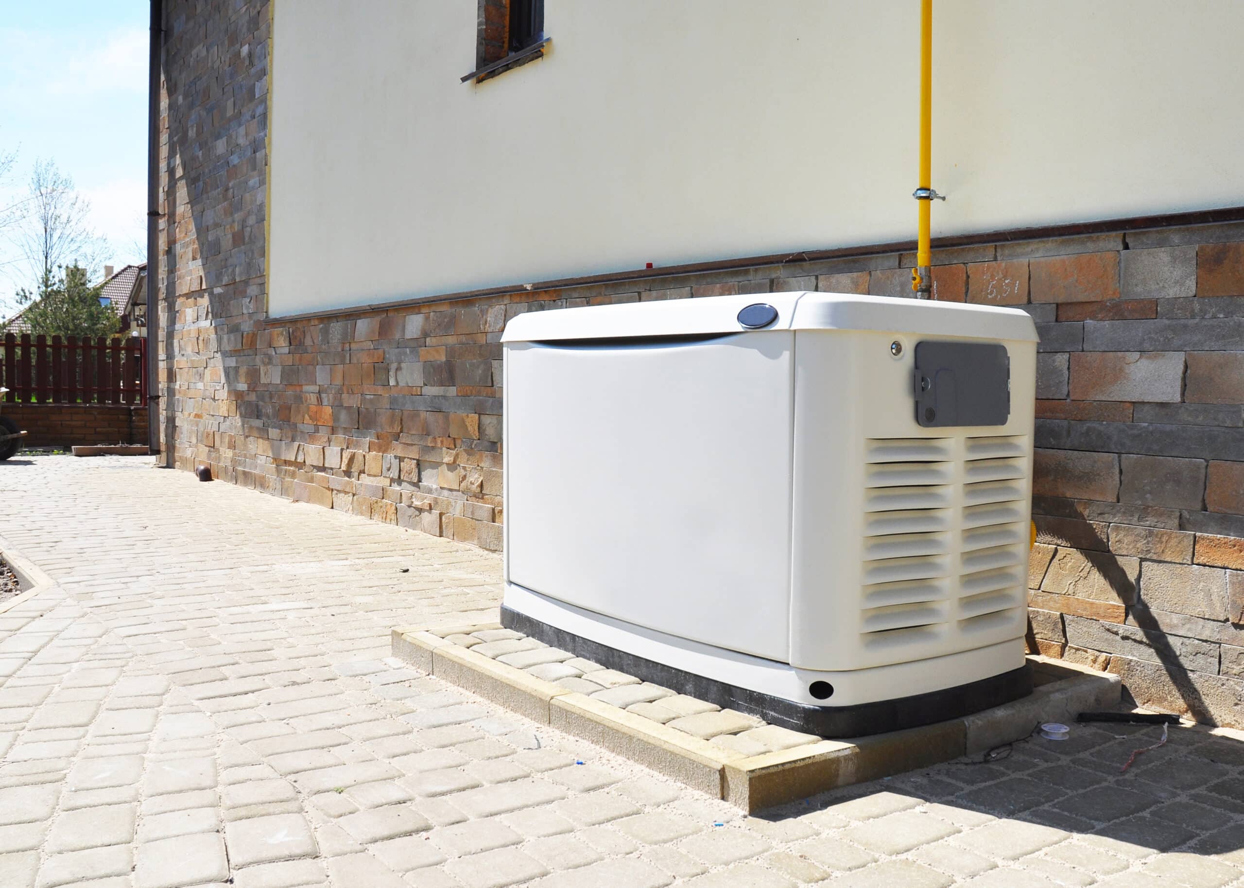 residential backup generator positioned outside of a home in san antonio