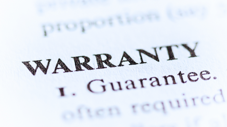 A close up, focused image of a warranty document.