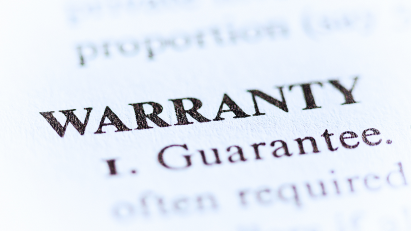 A close up, focused image of a warranty document.