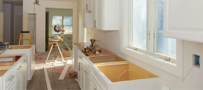 home kitchen being renovated cabinets with no countertops